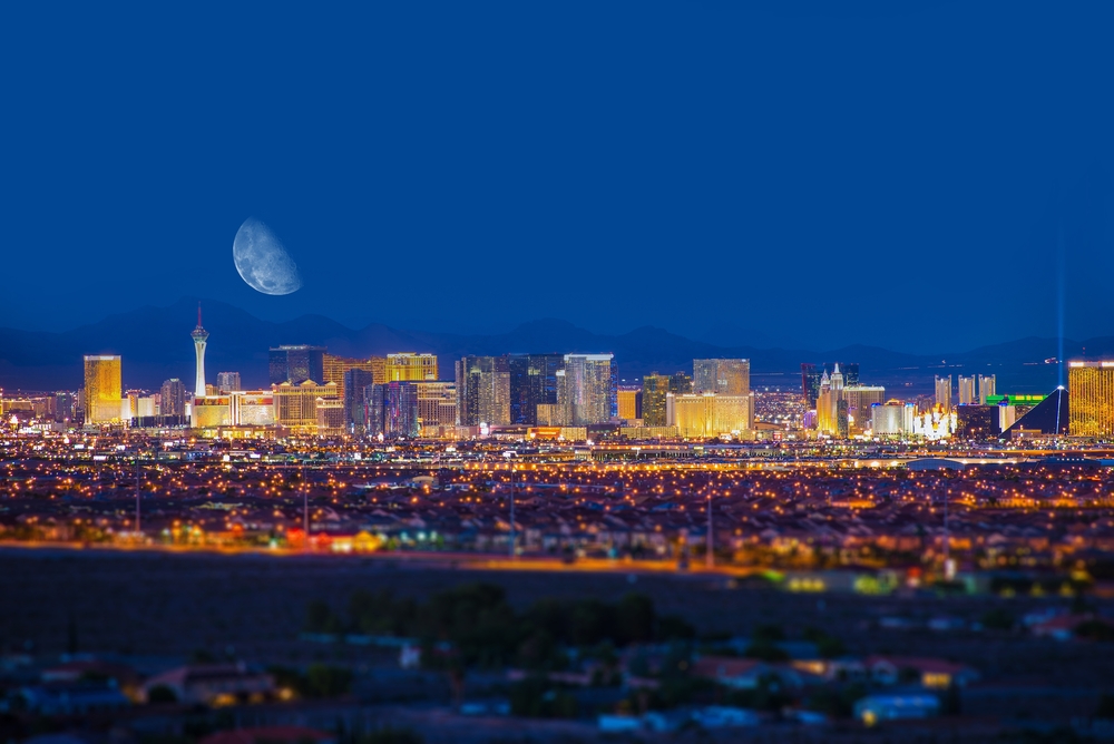 night skyline of Las Vegas with the moon in the background