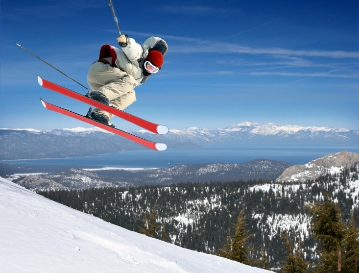 action shot of skier jumping in air